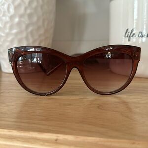 Brown Max Studio sunglasses.